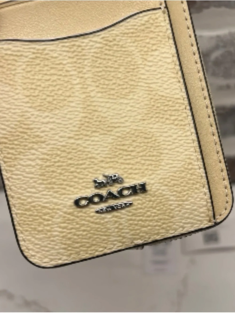 Coach Zip Card Case In Signature Canvas in the color Hay